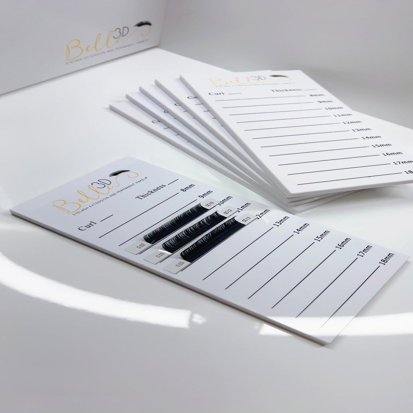 Acrylic Lash Tile displaying various eyelash extension lengths with curl, thickness, and extension type details.