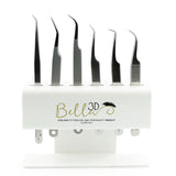 Acrylic Tweezer Stand holding seven precision tweezers for eyelash extension and permanent makeup supplies