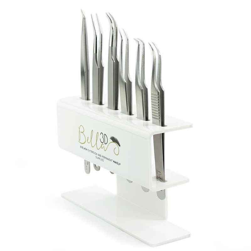 Acrylic Tweezer Stand holding multiple silver tweezers for eyelash extension and permanent make-up use.