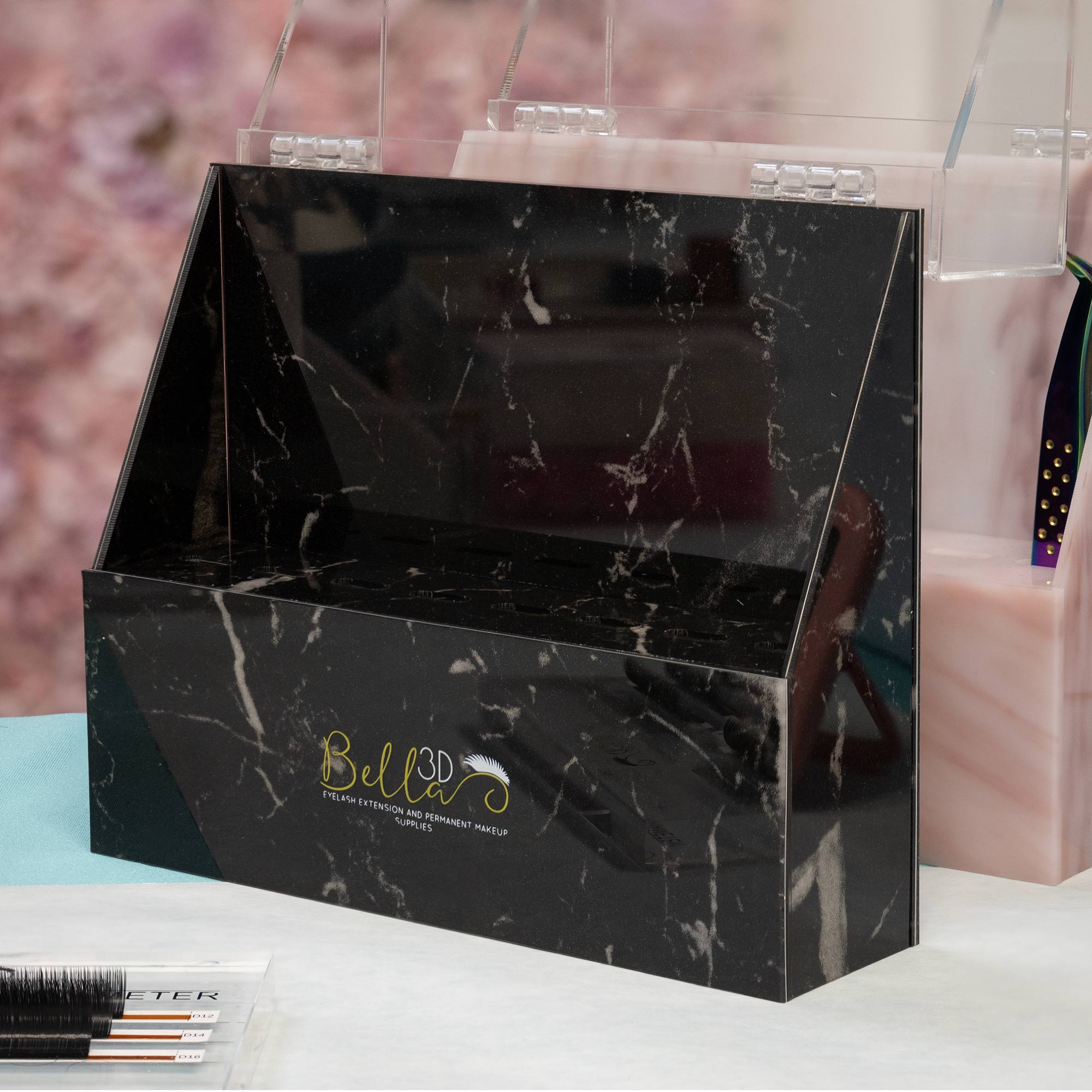 Acrylic Tweezer Stand in black marble pattern with Bella 3D logo for organizing eyelash extension accessories