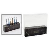Acrylic Tweezer Stand made of black marble with clear protective cover for organizing eyelash extension tools.