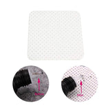 Adhesive Nozzle Wipes with textured surface shown cleaning adhesive residue from a glue bottle nozzle before and after use.