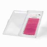 Chroma Series Colored Lashes - 0.07 in vibrant pink shades arranged in clear plastic storage case for eyelash extensions.