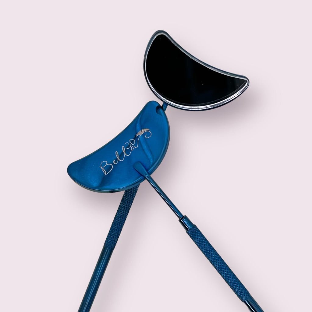 Crescent Blue Moon Mirror with blue metallic handle designed for precise eyelash extension application and accessories use