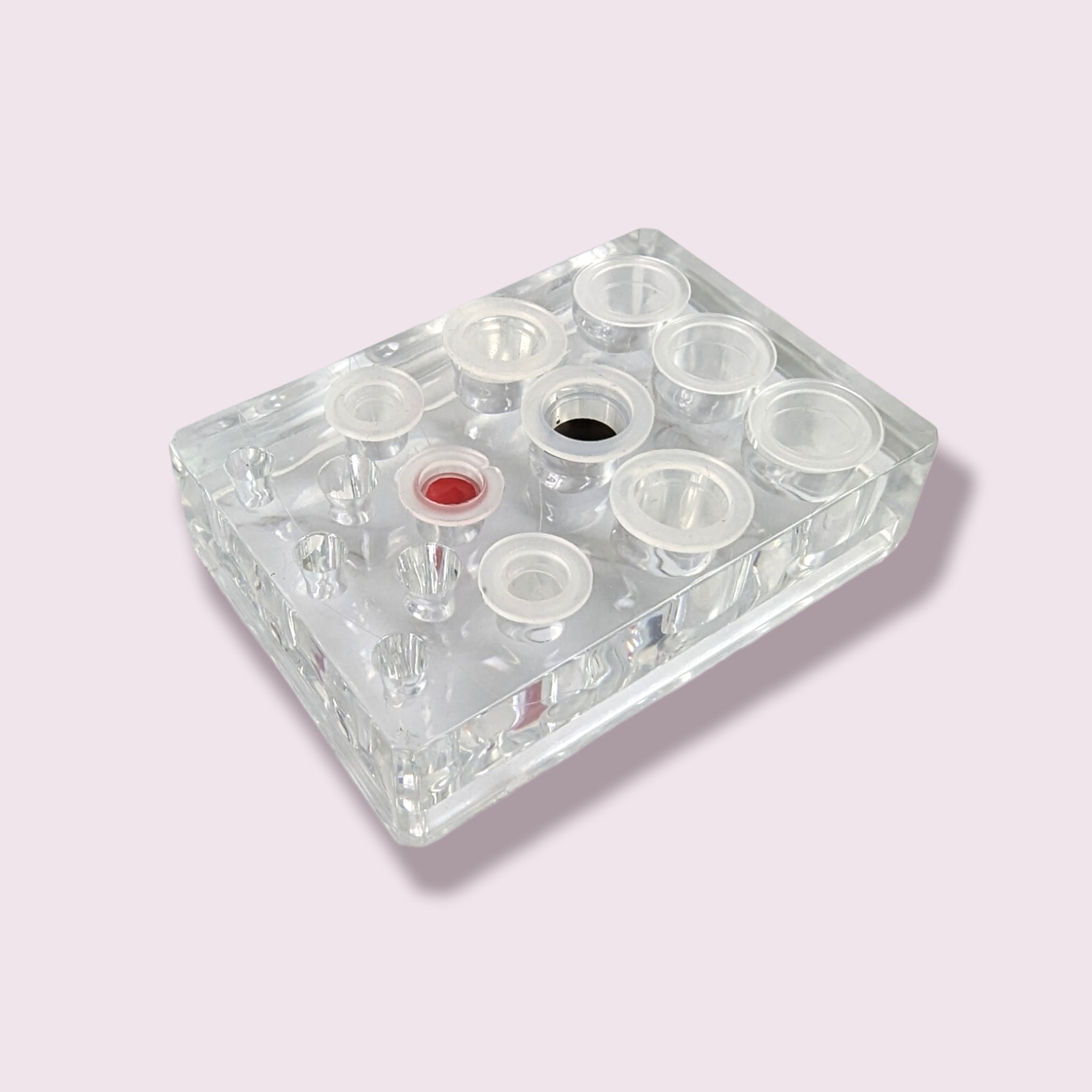 Clear organizer with multiple compartments for eyelash extension supplies in a Crystal Acrylic Tray design