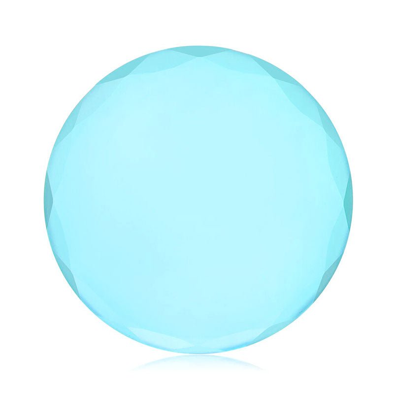 Blue faceted round stone reflecting light, used with Crystal Lash Glue Stones for eyelash extension accessories.