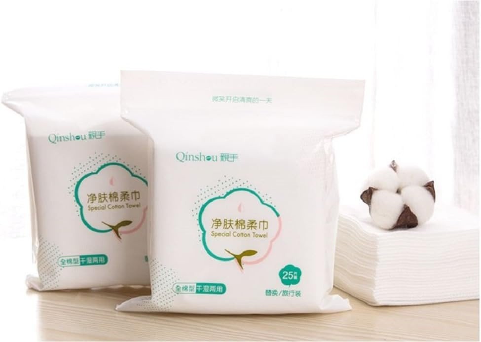 Disposable Face Towels (100ct) packaged with cotton balls and a stack of soft white towels in the background