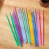 Disposable Micro Tip Applicators in various colors for precise application in eyelash extension and microblading use.