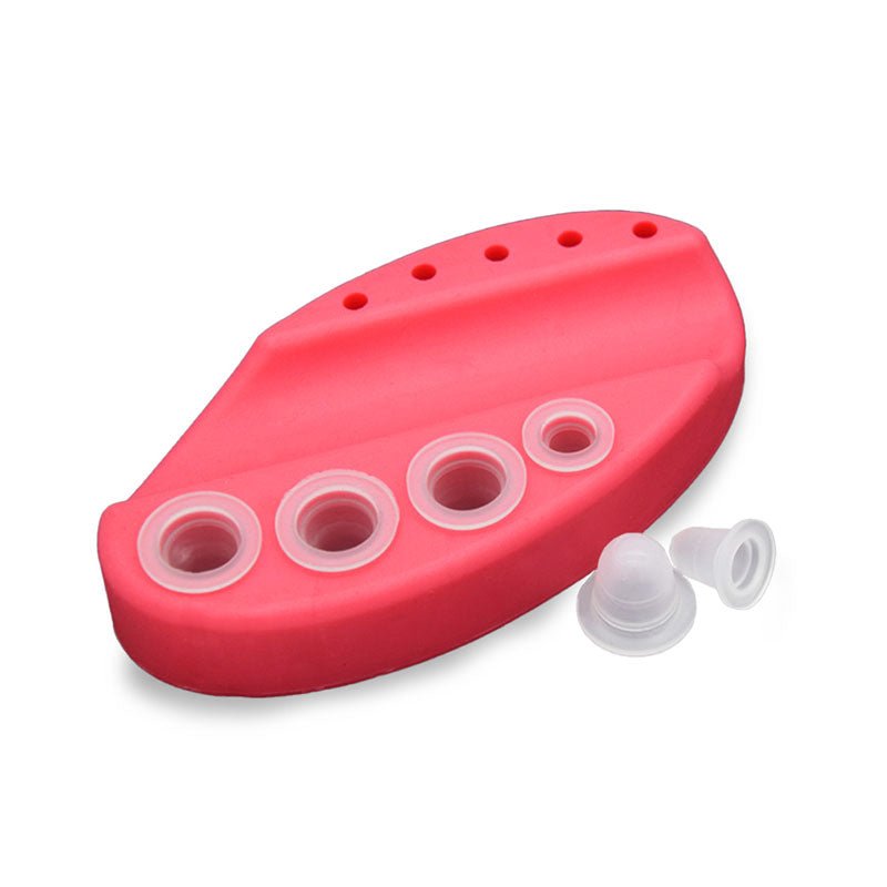 Disposable Silicone Ink Cups set in a red silicone holder designed for easy access during tattoo or microblading work