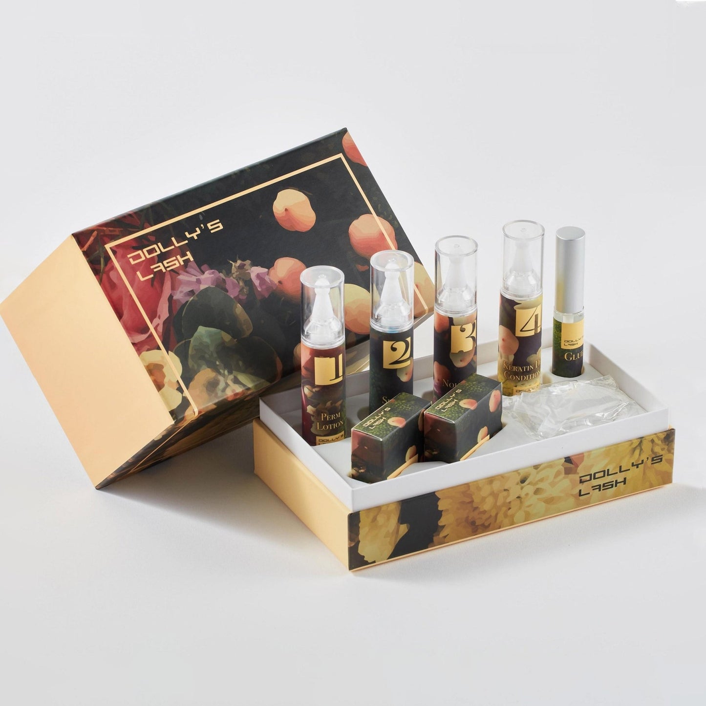 Dolly’s Lash Lift Kit with numbered solution bottles and applicators in decorative packaging for eyelash treatments