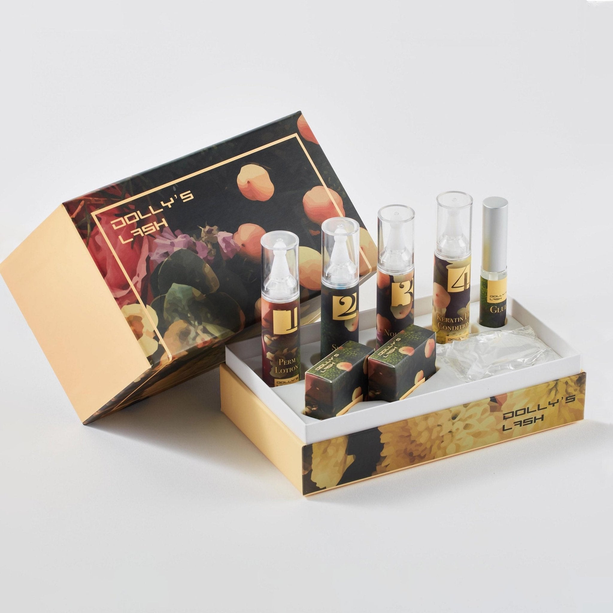 Dolly’s Lash Lift Kit with numbered solution bottles and applicators in decorative packaging for eyelash treatments