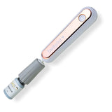 Sleek Electric Glue Shaker - Rechargable with white and rose gold accents holding eyelash extension adhesive bottle.