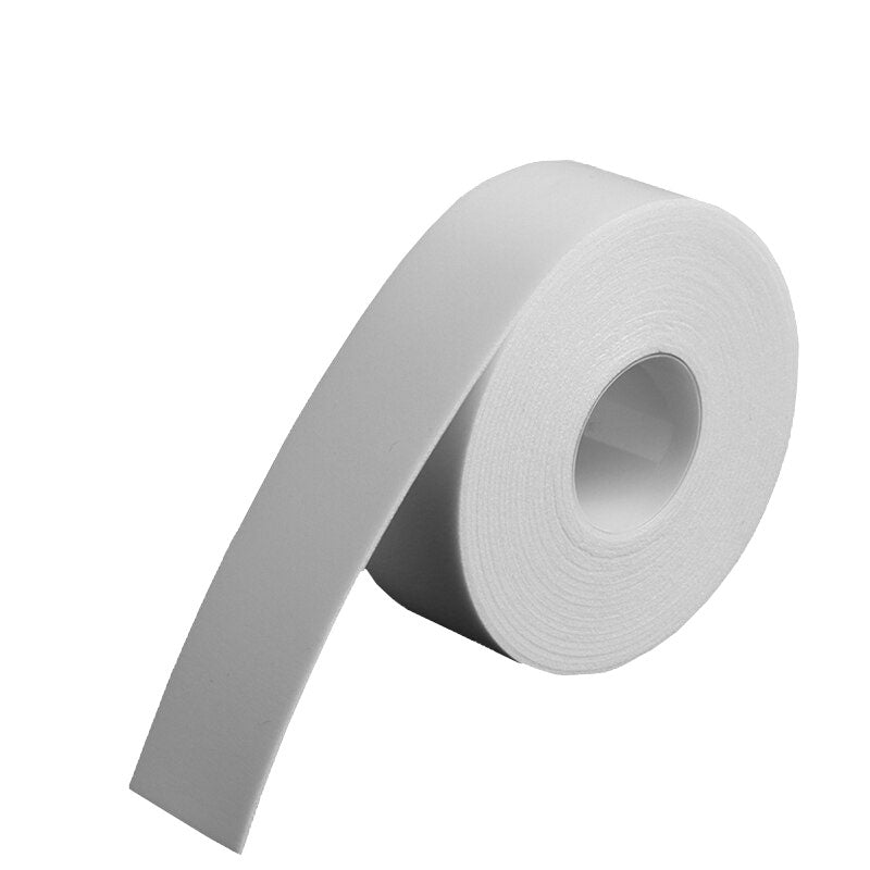 Roll of white foam tape used as an eyelash extension accessory for secure application and protection