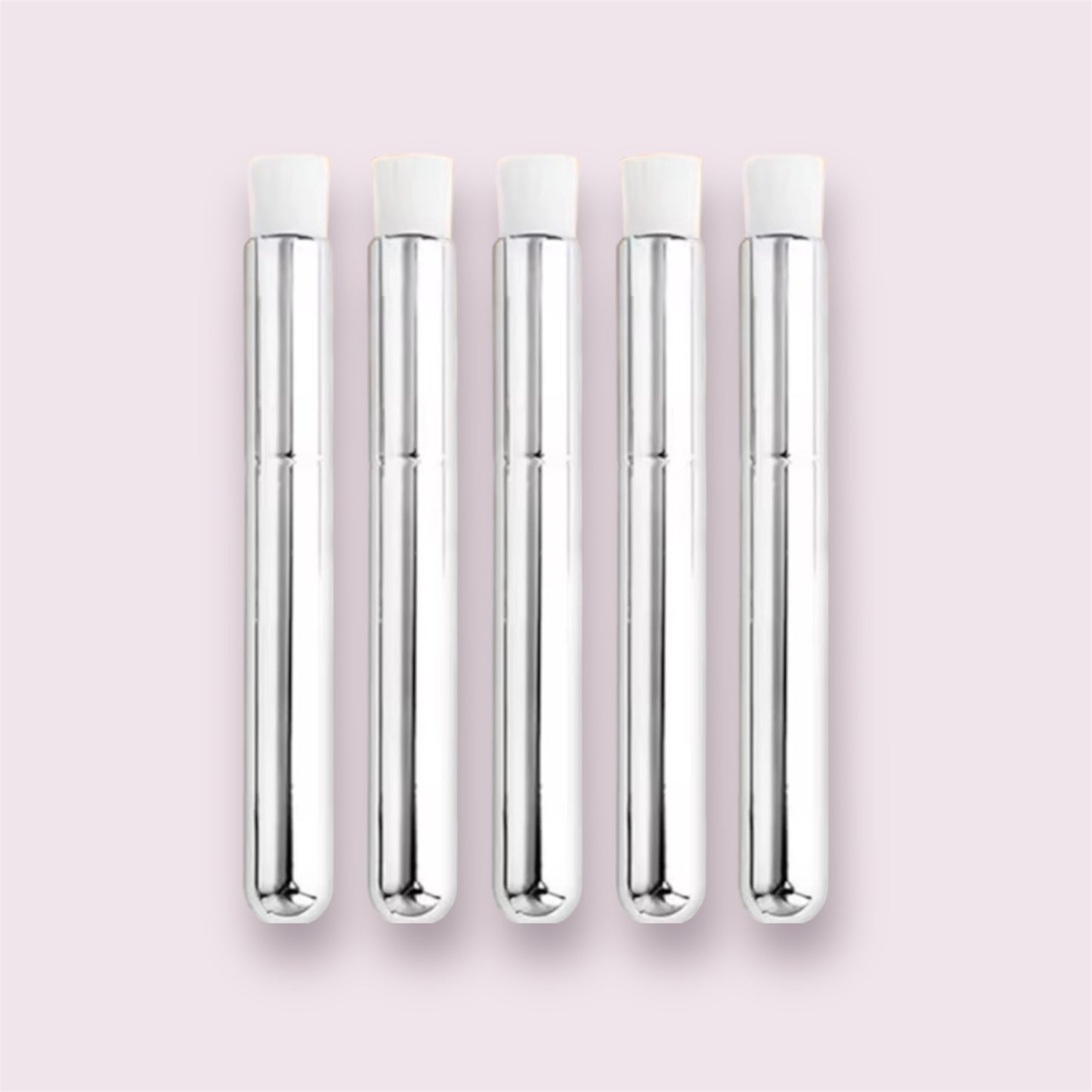 Five sleek metallic lash cleansing brushes with white bristles arranged in a row on a pale background Lash Cleansing Brushes (Retail Pack)