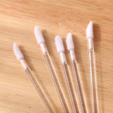 Clear handle applicators with soft white tips, ideal for precise cosmetic or eyelash extension use Lip Wands