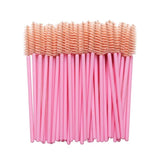 A bundle of pink mascara wands with soft bristles, ideal for eyelash extensions and makeup application.