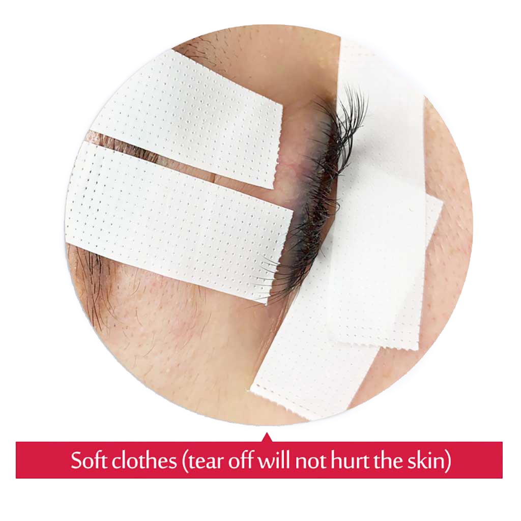 Nichiban Skinergate Flexible Tape applied around an eye with eyelash extensions showing soft, perforated white tape.