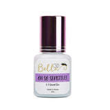 Bottle of OH SO SENSITIVE! Adhesive eyelash extension glue with purple label and dark metallic cap