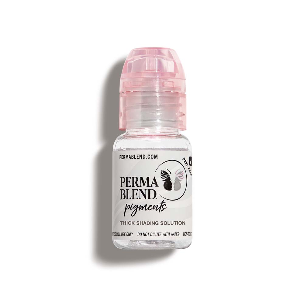 Small clear bottle with pink cap containing Perma Blend Thick Shading Solution for permanent makeup pigments.