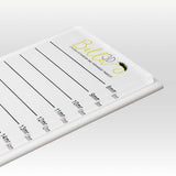 Protected Acrylic Lash Tile with length markings for eyelash extension accessories and adhesive application.