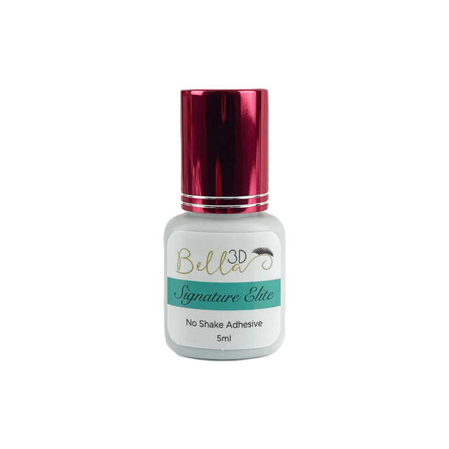 Small white bottle of Signature Elite No Shake Adhesive eyelash extension glue with metallic red cap and teal label.