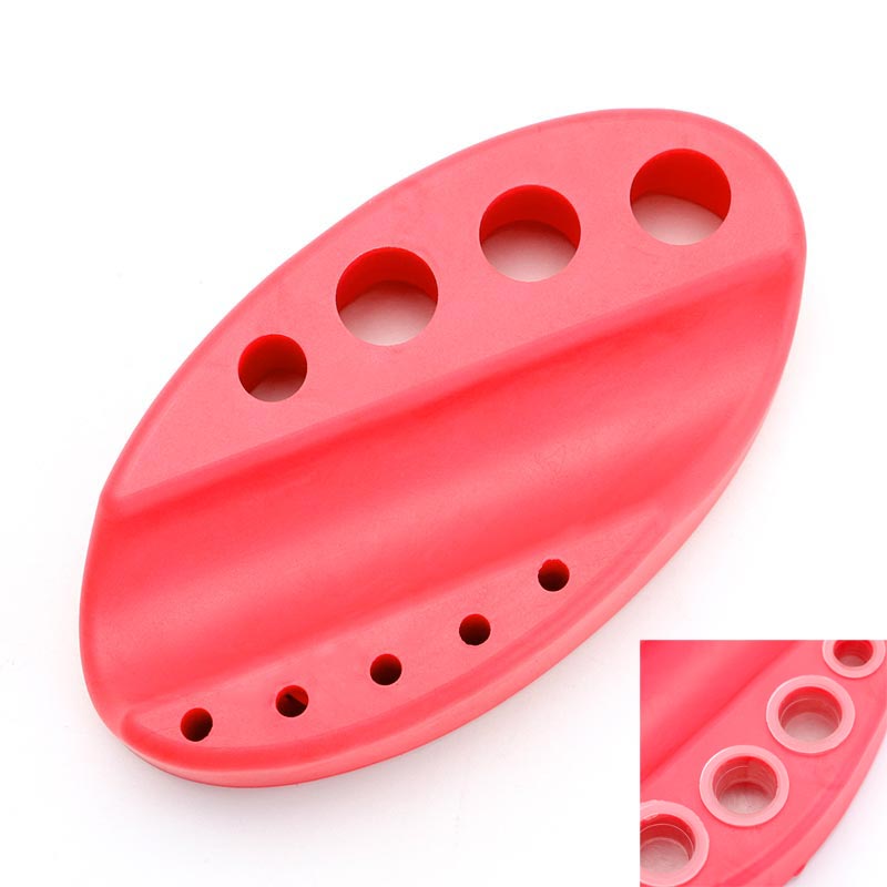 Red Silicone Ink Cup Holder with multiple sized holes for eyelash extension accessories and adhesive tools organization