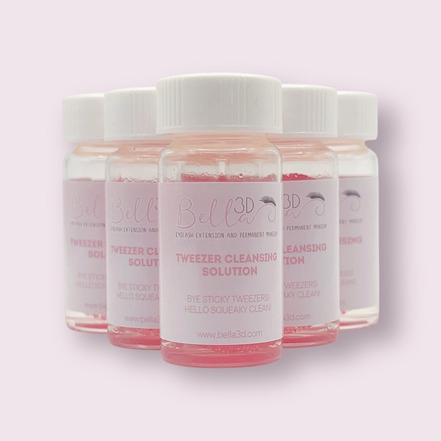 Clear bottles of Tweezer Cleansing Solution with pink liquid for cleaning eyelash extension accessories.
