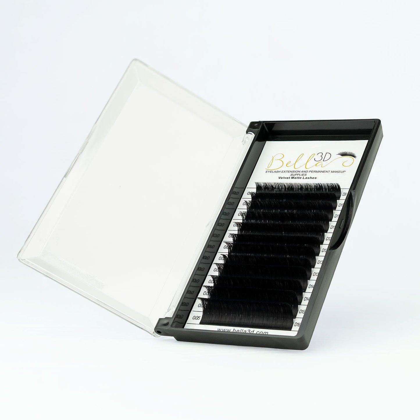 Open black tray of Velvet Matte Lashes - 0.05 eyelash extensions arranged in rows on white background