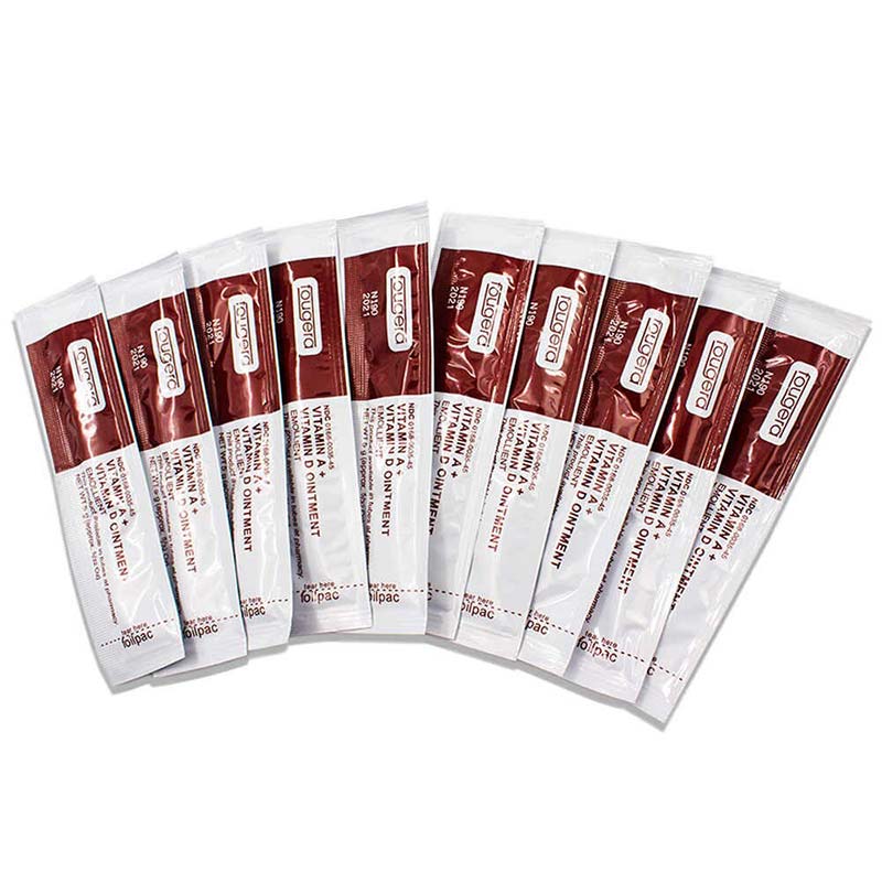 Tubes of Vitamin A&D Ointment arranged side by side with white and maroon packaging in a curved layout