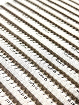 Close-up of multiple Wispy Promade Fans 8D | 0.05 CC eyelash extension fans arranged in rows with size labels