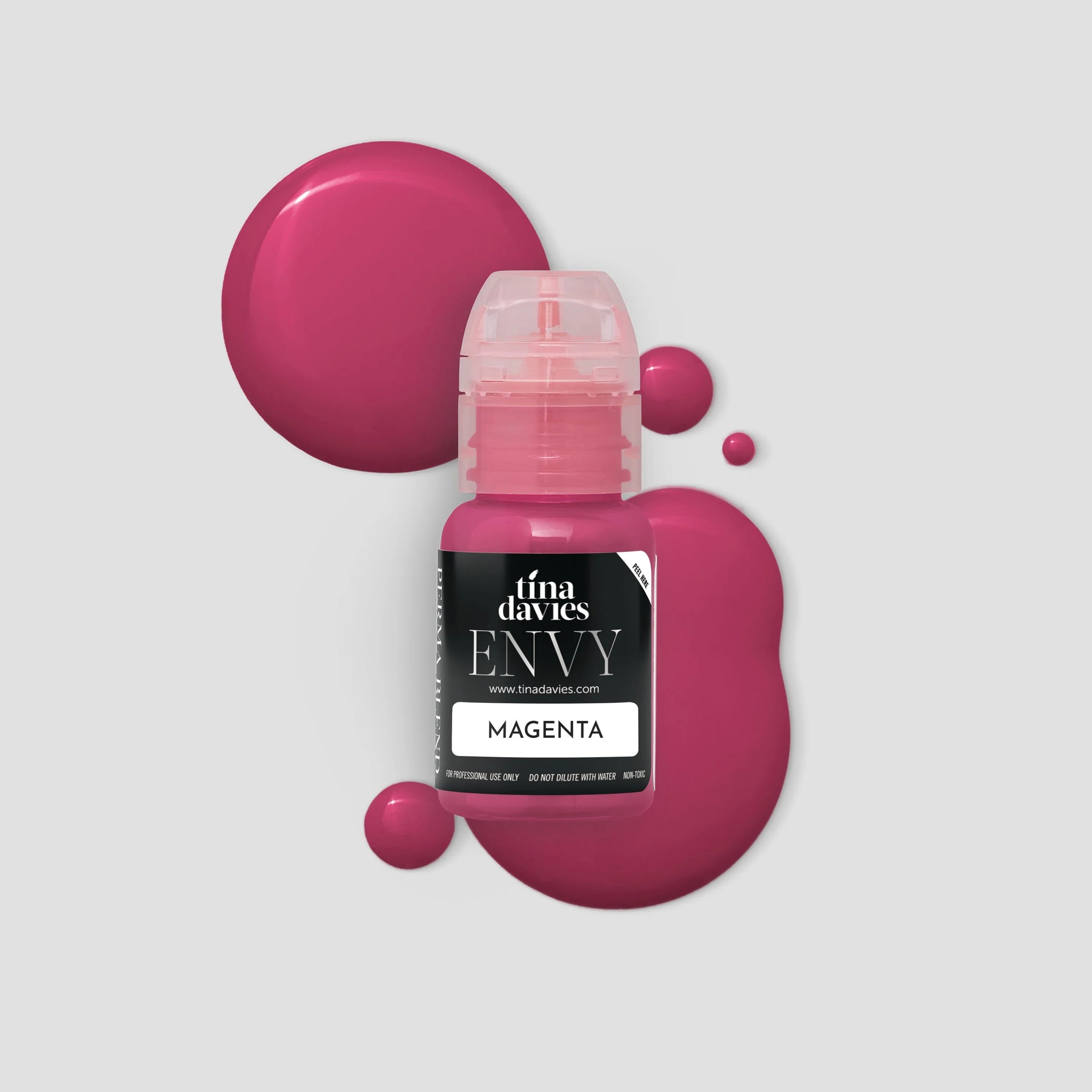 tina davies envy lip pigment bottle in magenta color
