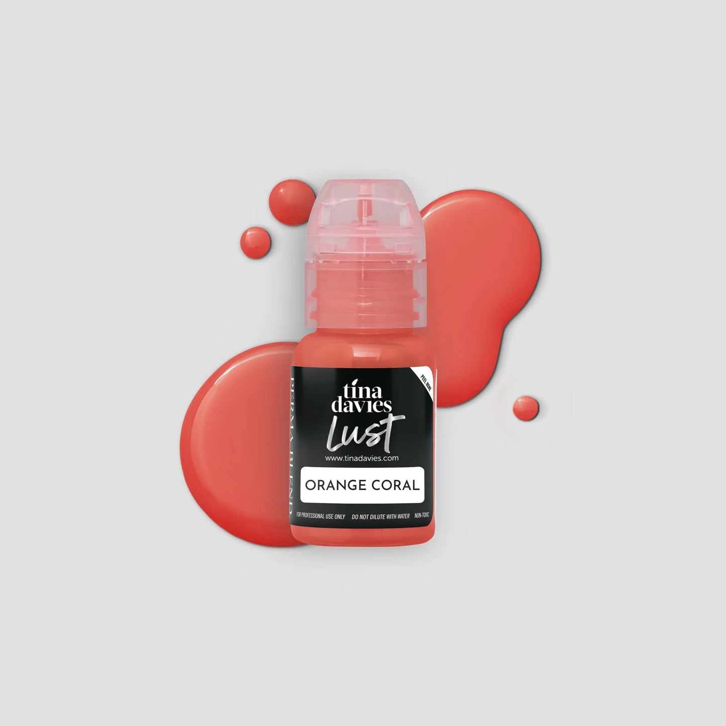 Bottle of Tina Davies Lust Orange Coral paint with color swatches on a light gray background
